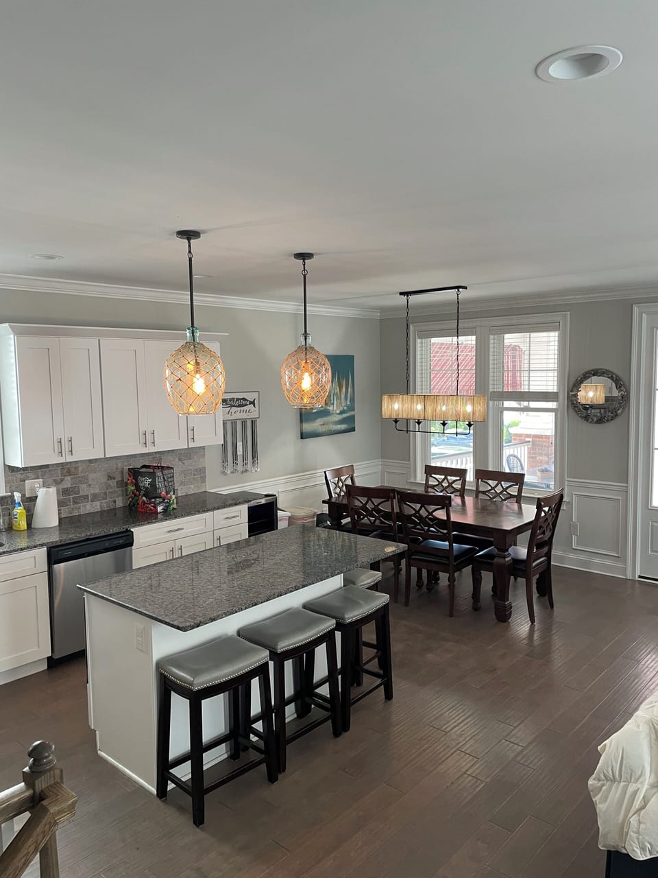 View of Kitchen and Dining Area.  Lighting upgraded in September 2024!