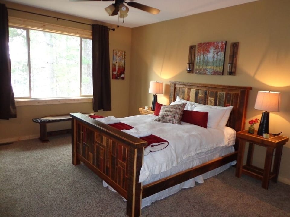Master has custom made furniture, TV, large walk in closet and attached bath