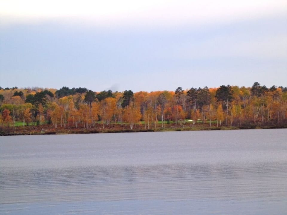Across the lake from hole #16 at the TOP RATED Legends Golf Course