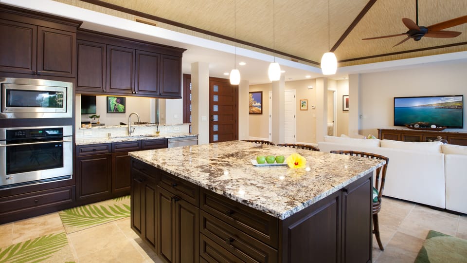 Prepare meals while spending time with family and friends in the open concept living area