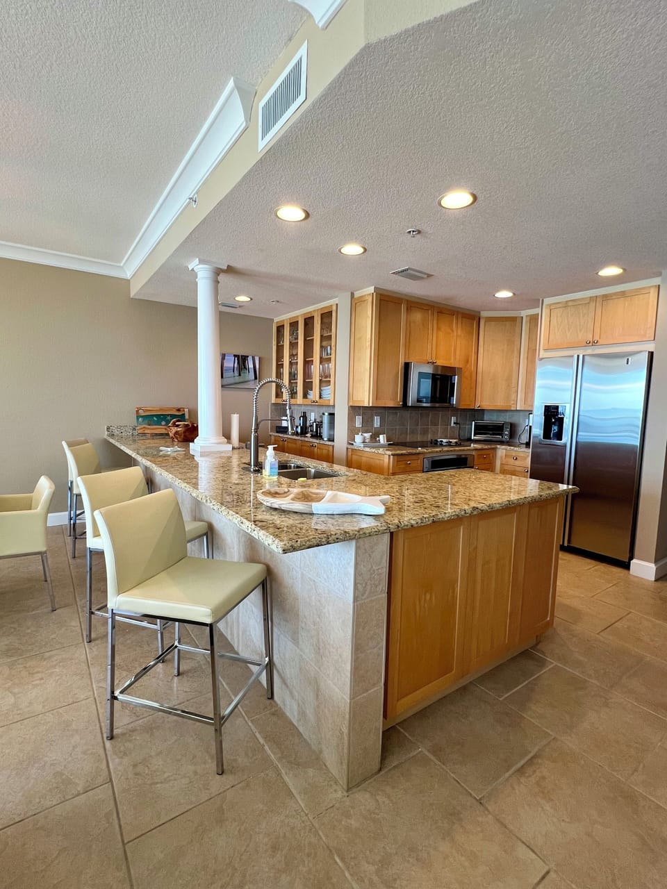 View of Kitchen and bar area from living room