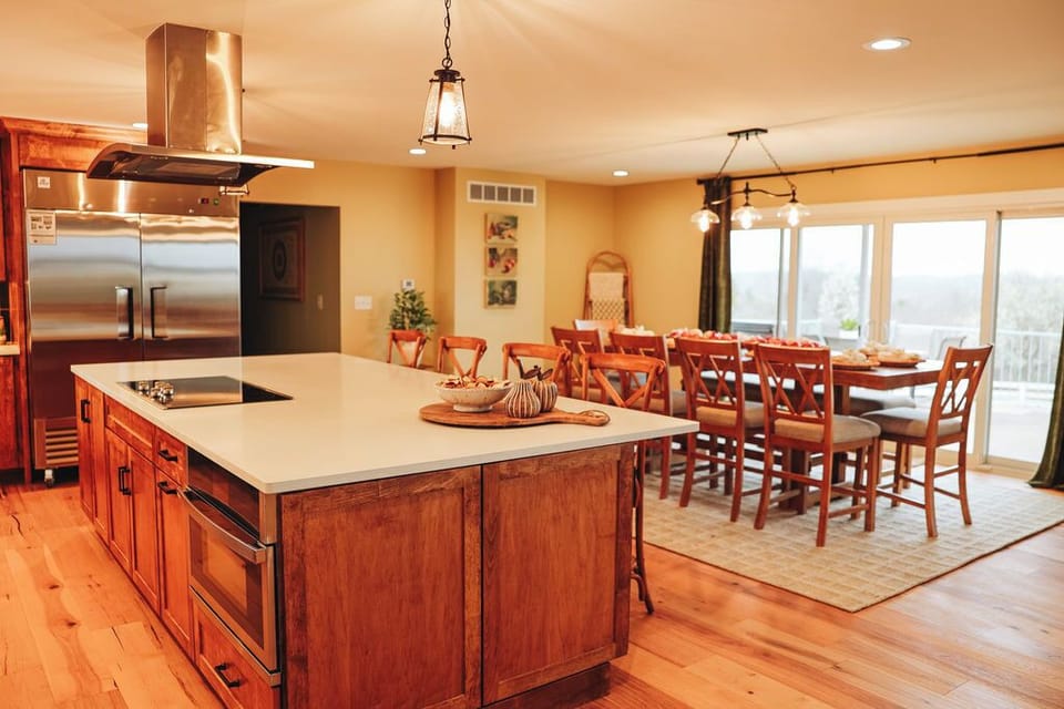 Overlook the pool from the kitchen and dining spaces. Pool is open May-Mid Oct.