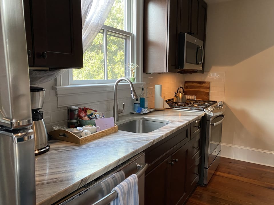 Nothing more needed - all the appliances AND stunning stone countertops.