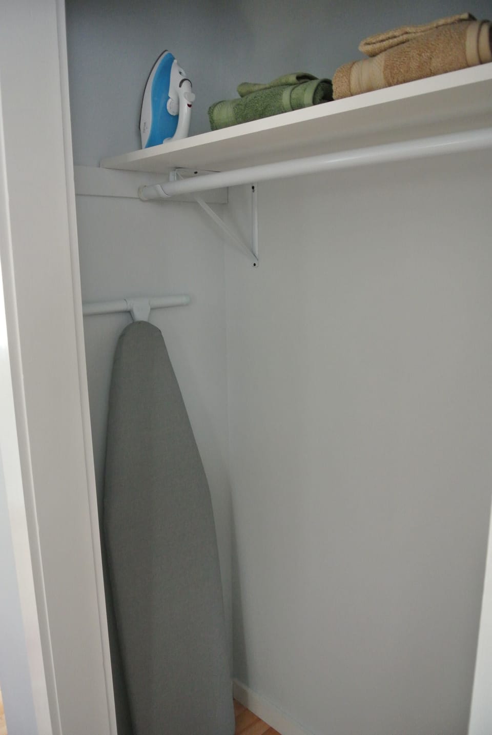 Ironing board and Iron with extra bath towels