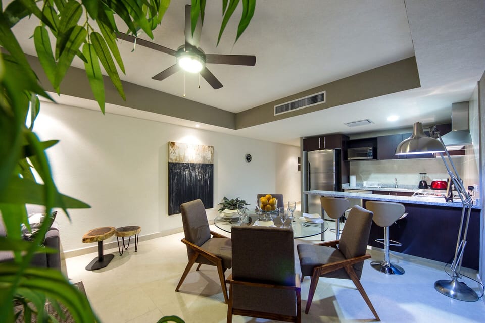 Dining area. and kitchen. Barstools