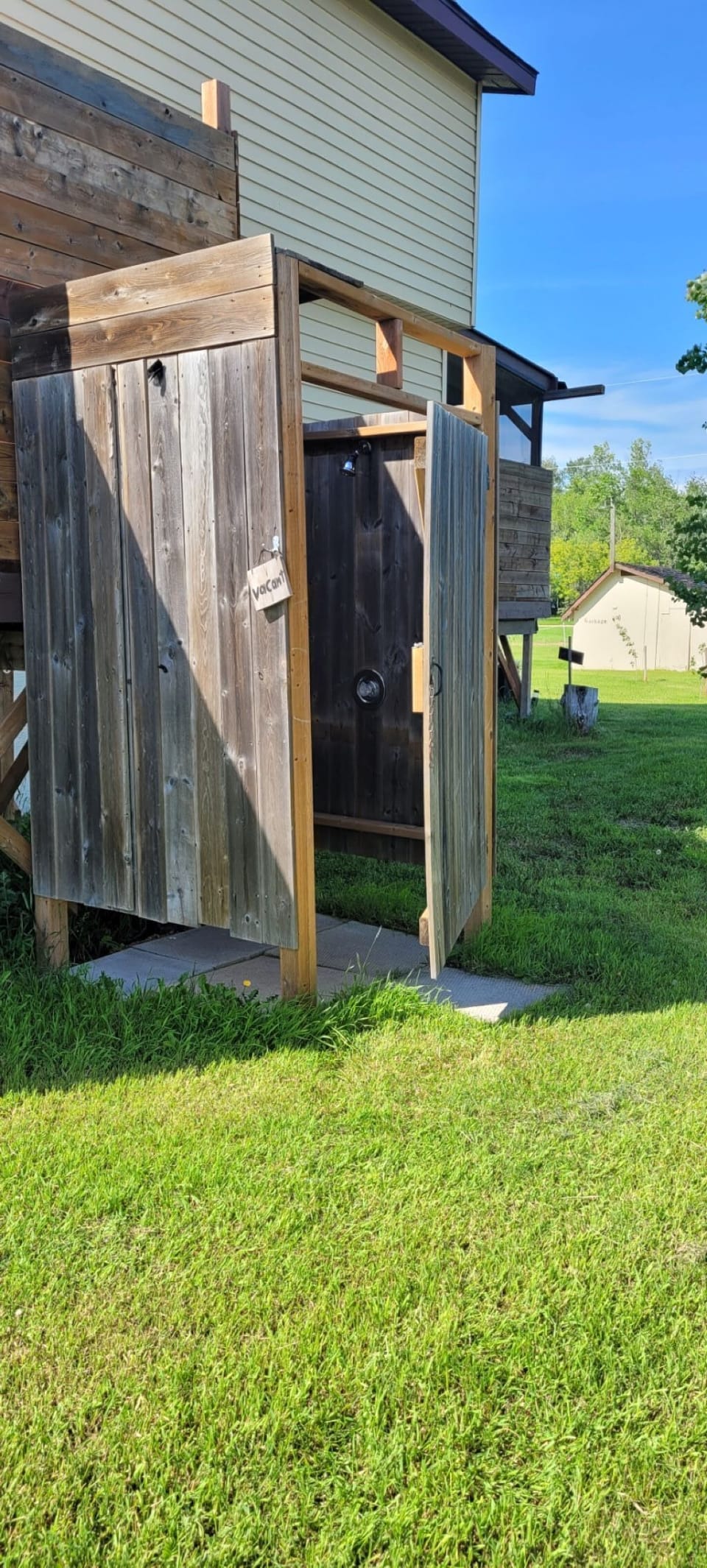 The private outdoor shower has hot and cold water.