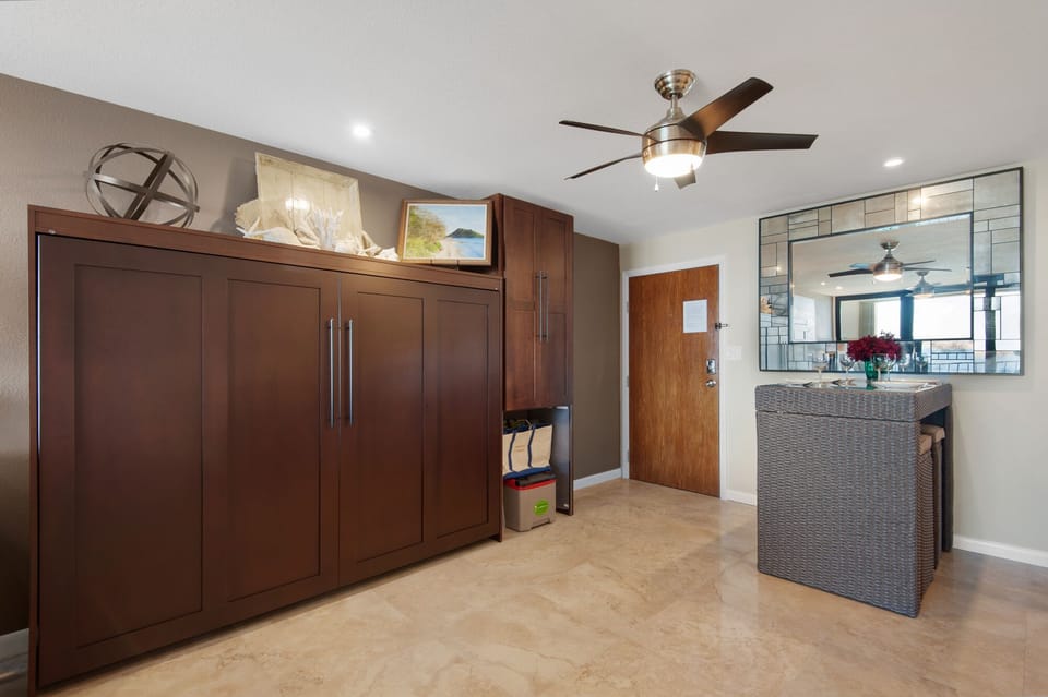 Queen Murphy Bed, ample room when closed.  Guest storage tower on right.
