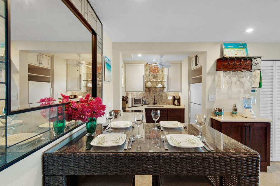 Efficient kitchen, dining table & bar with all your vacation needs...