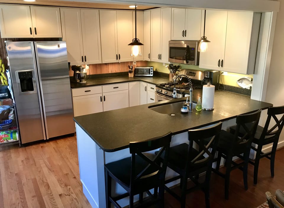 Gourmet kitchen with granite and stainless steel.  Fully stocked!