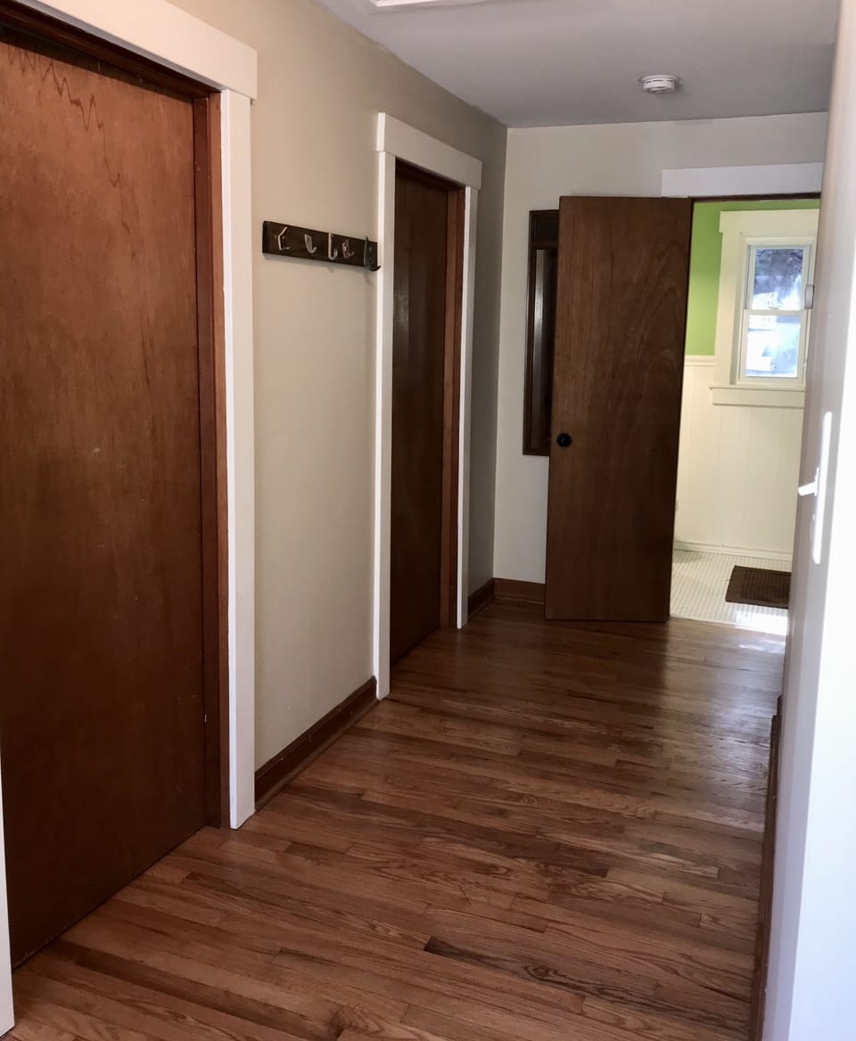 View of upstairs hallway and bath