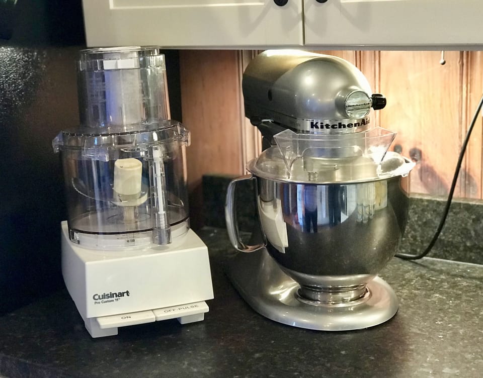 Fully stocked kitchen including a premium assortment of appliances
