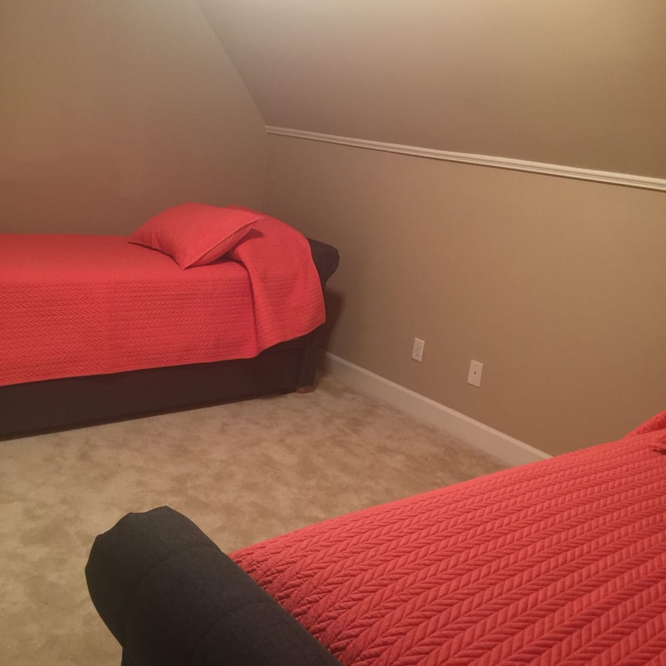 Room with 2 twins (trundle with each).   Other furniture/wall decor to be added