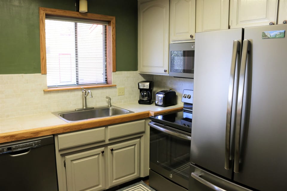Stovetop/Oven, Microwave, large refrigerator, dishwasher, toaster, coffee maker