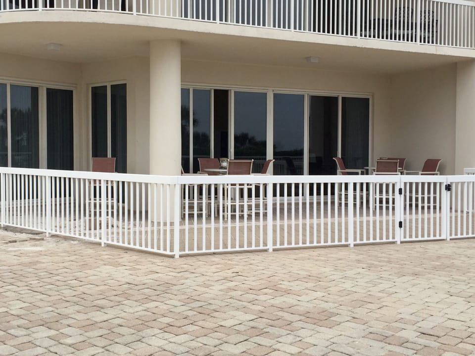 Patio with high-top tables. Lots of room on deck area with grills right there.