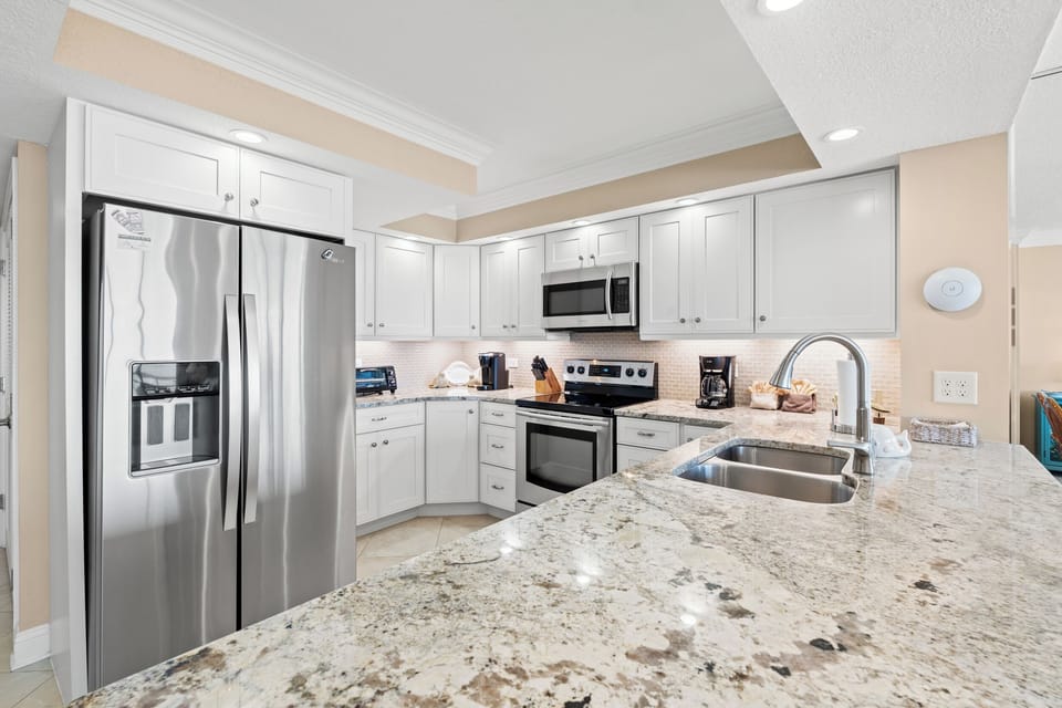 Kitchen includes a Keurig and a12 cup coffee maker and appliance upgrades.