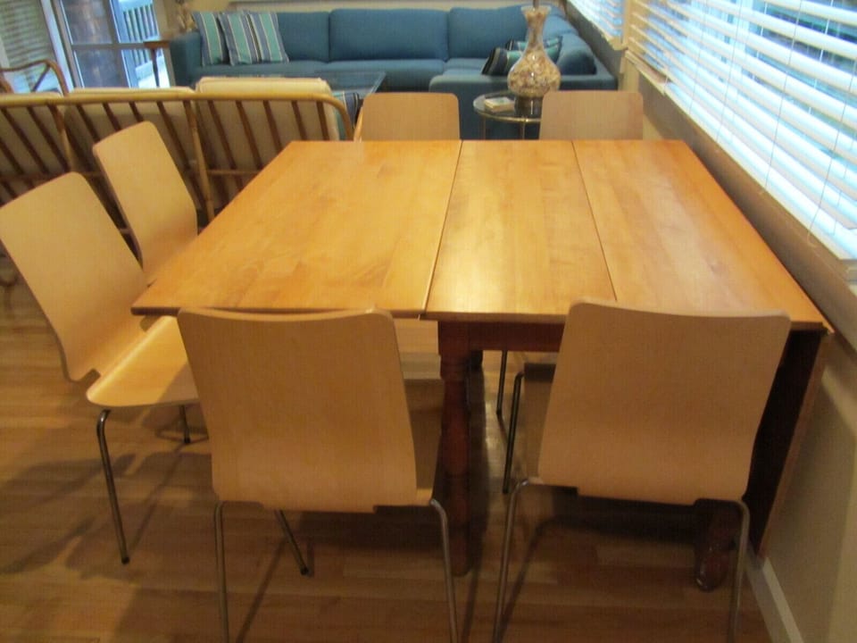 Hard rock maple dining room table expands to seat 10.