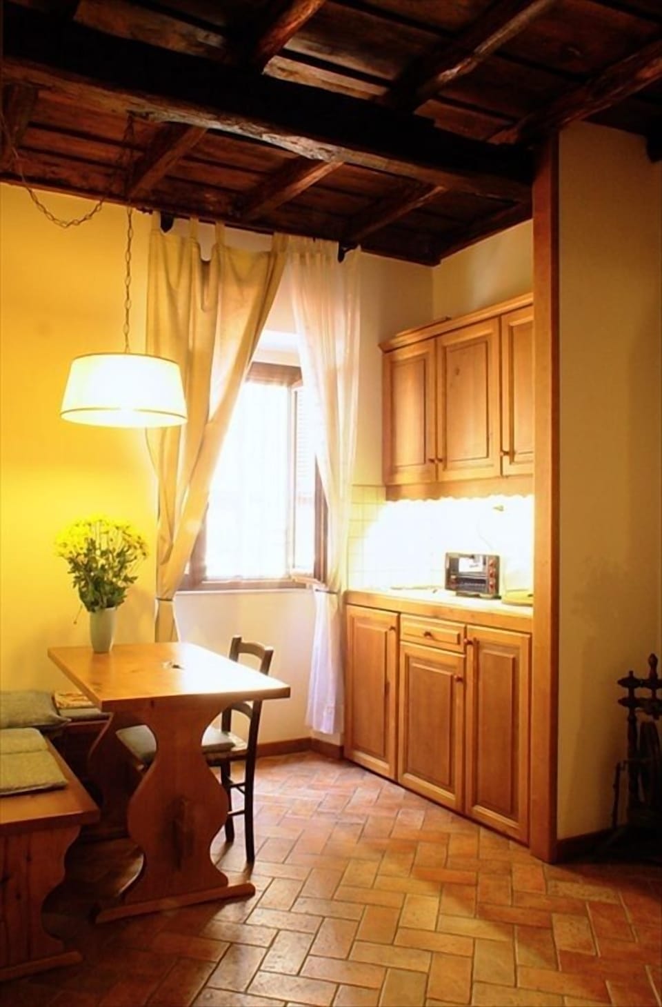 Table and kitchen corner.

