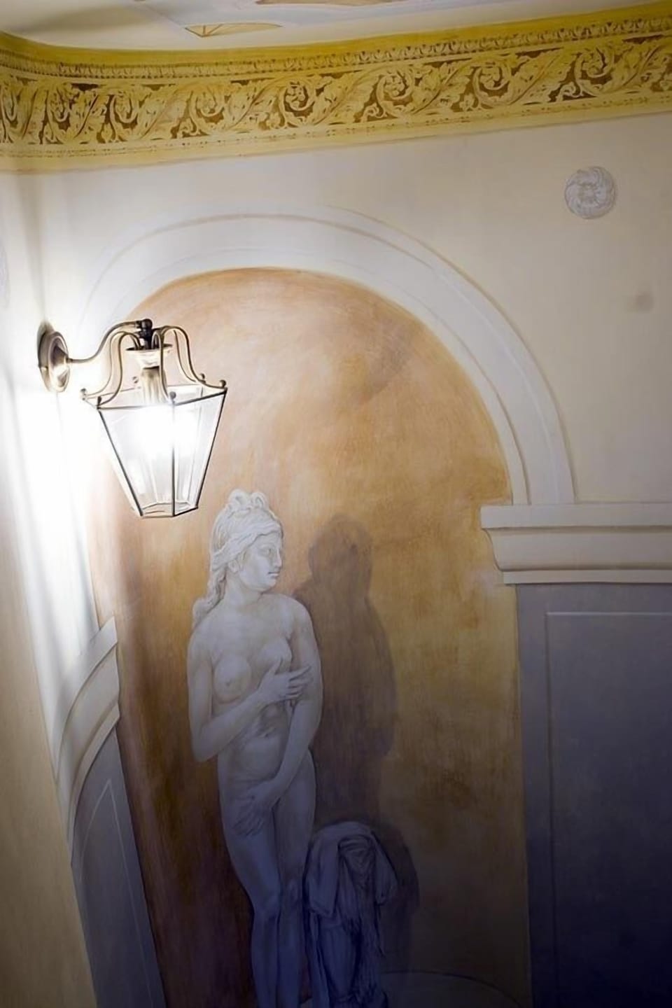 Stairs detail with old fashioned pictures
