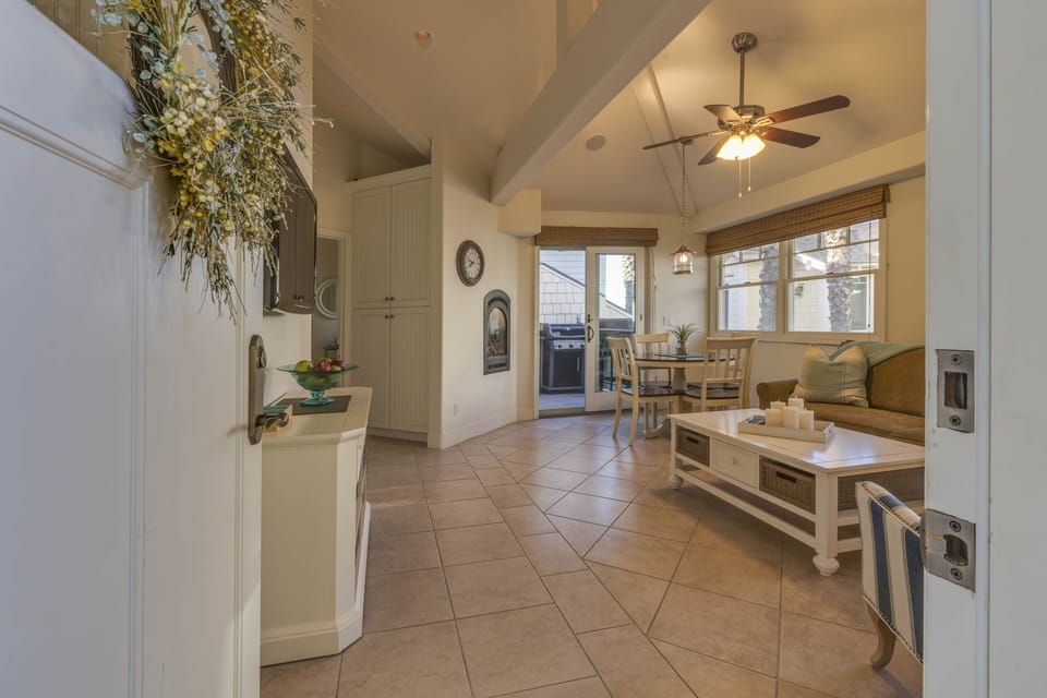 Living room showing door to porch
