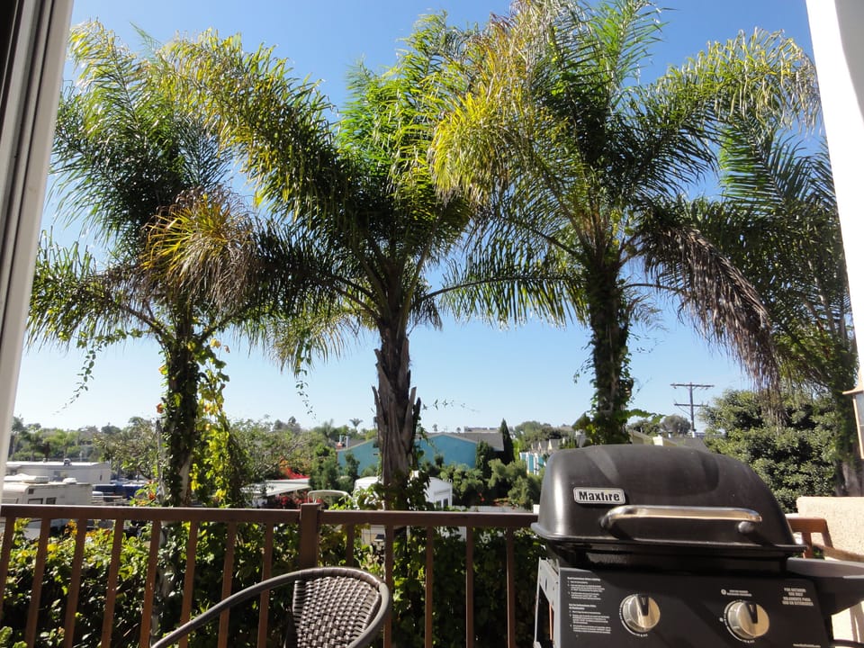 Daytime on balcony, barbeque
