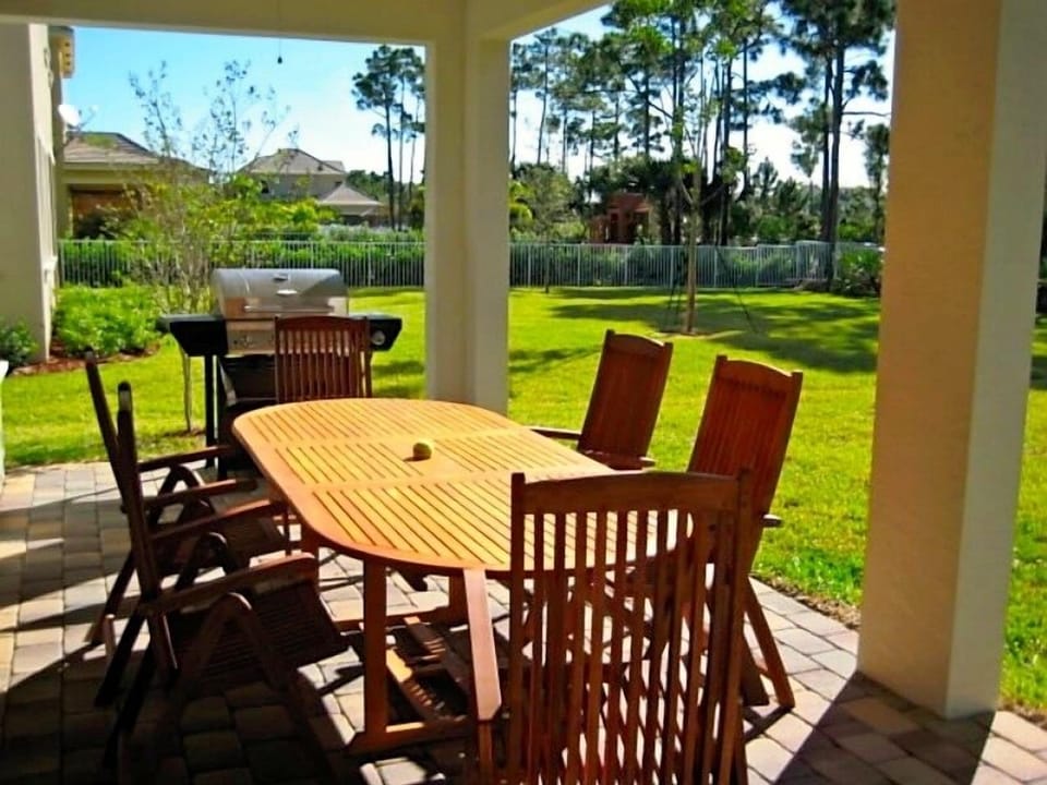 Covered Lanai for Patio Furniture and Grill