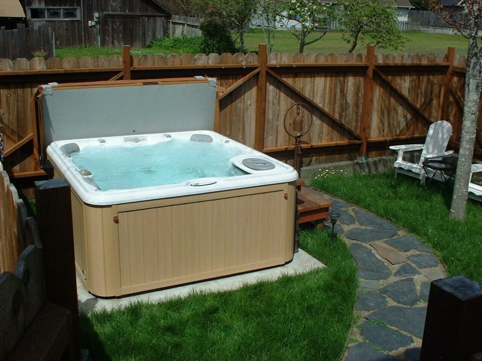 Hot tub in private enclosed yard for your use.