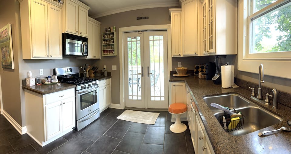 Open double doors to create wonderful indoor/outdoor space