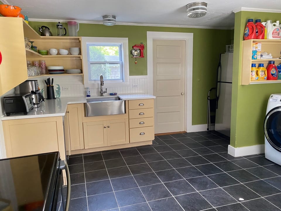 Large kitchen with open shelving.