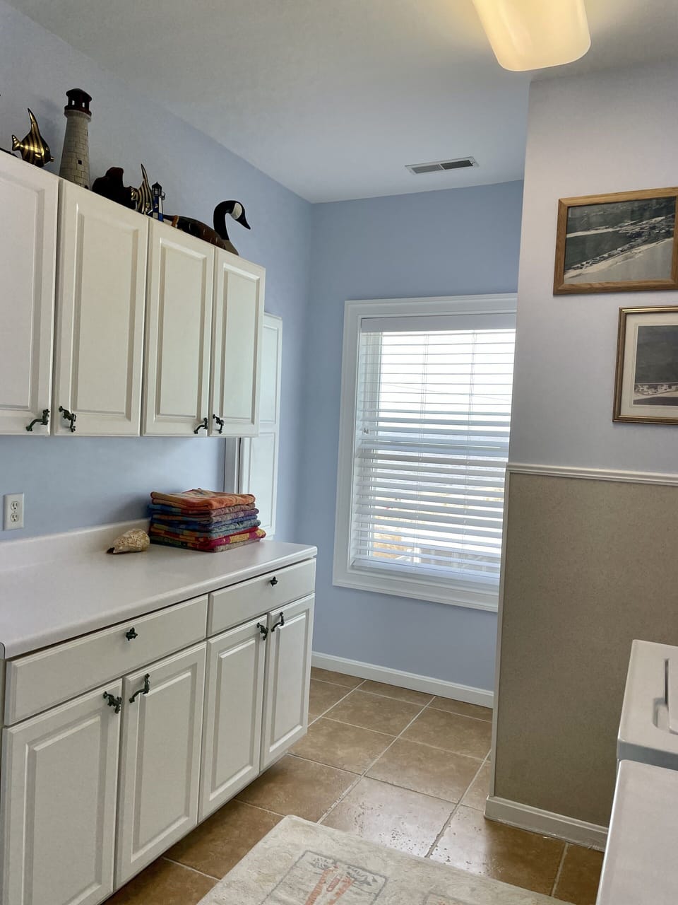 Spacious second floor laundry with plenty of counter space.