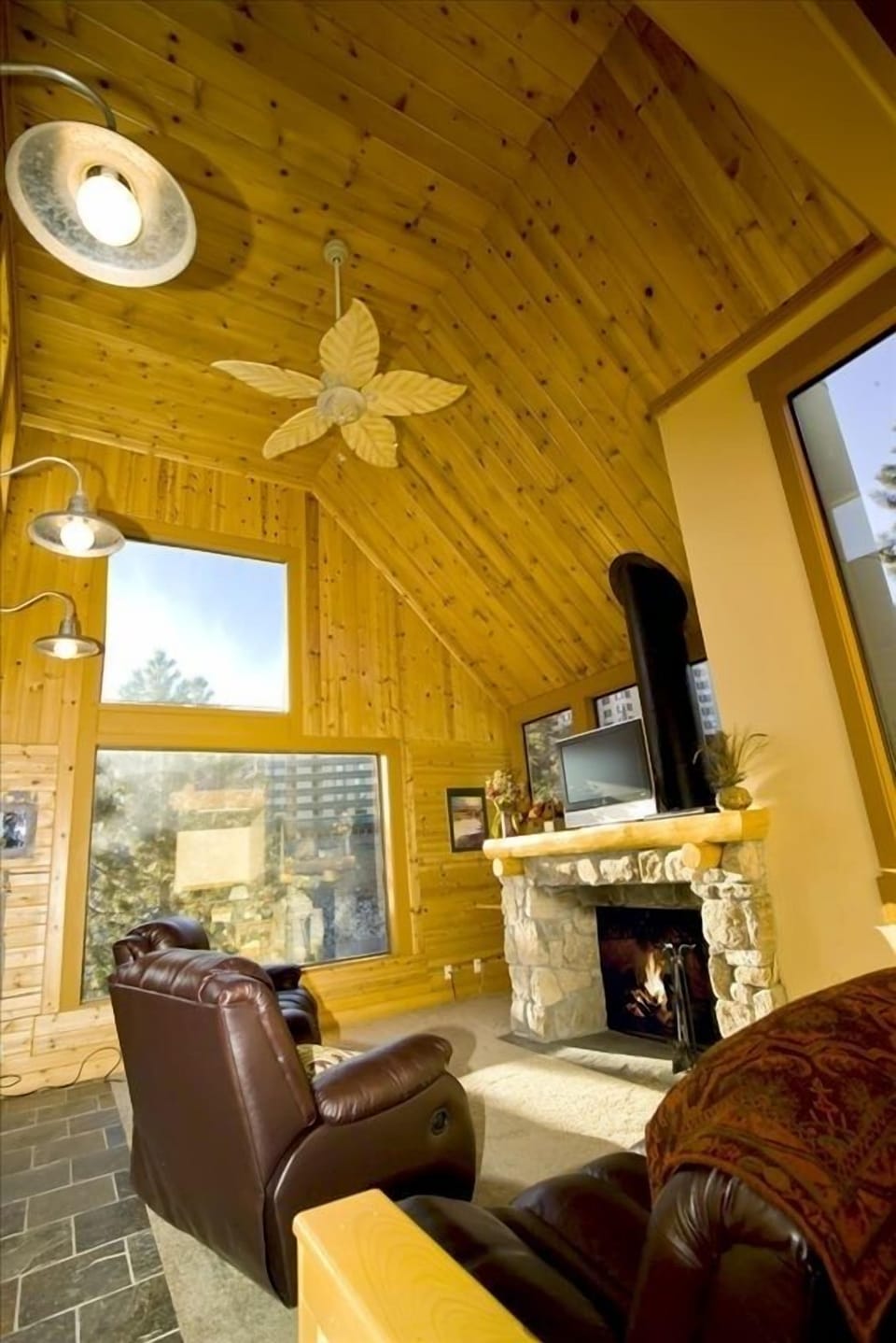 Living room with ceiling fan.
