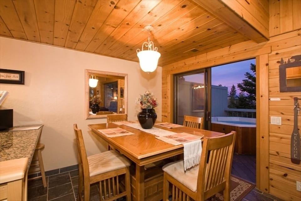 Large dining table with 4 chairs and bar counter