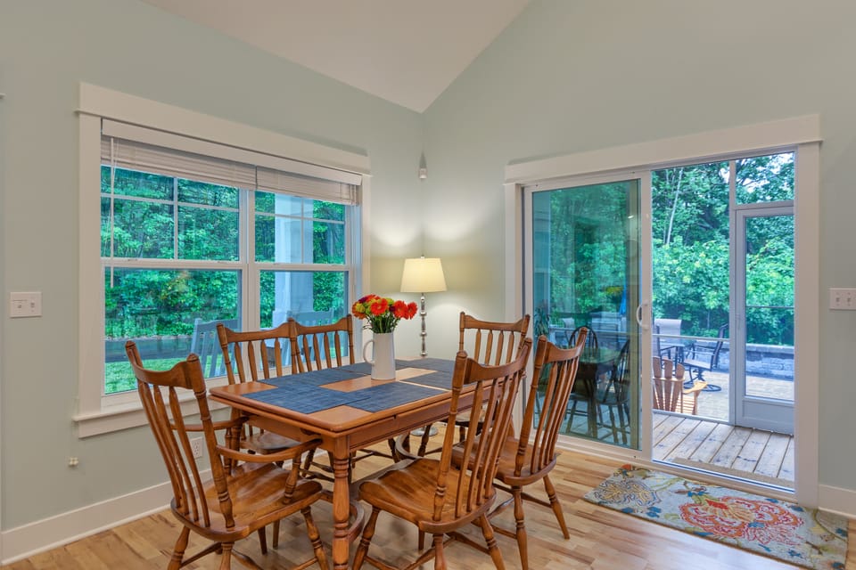 fully equipped kitchen with dishwasher, seating for 6-8 at the large table, two 
