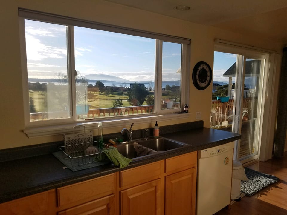 view out the kitchen window, access to the deck 