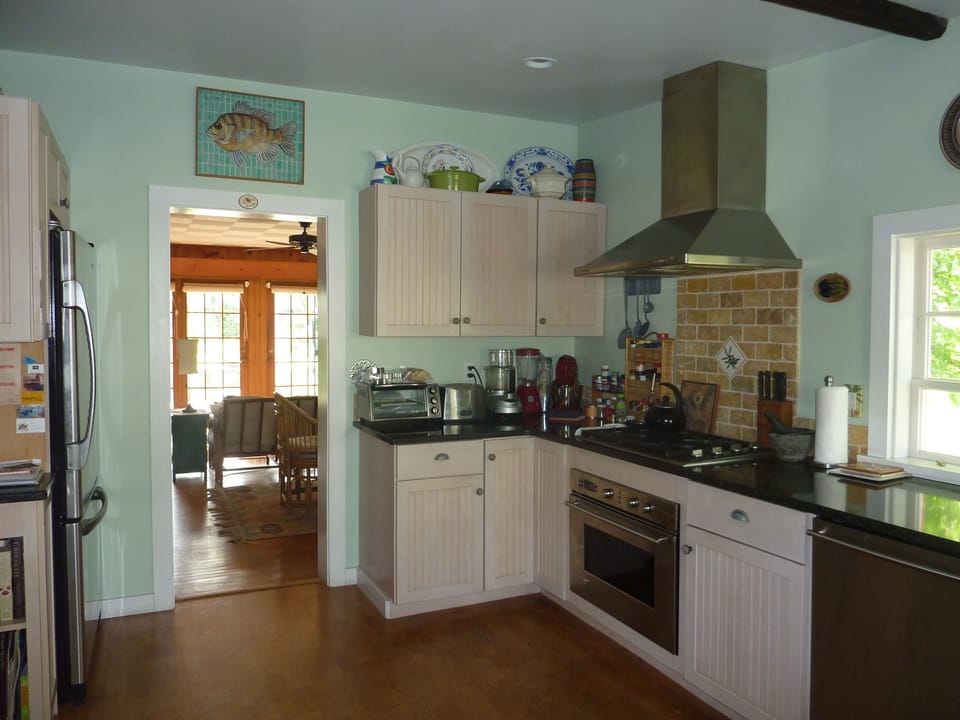 Kitchen leading to sunroom