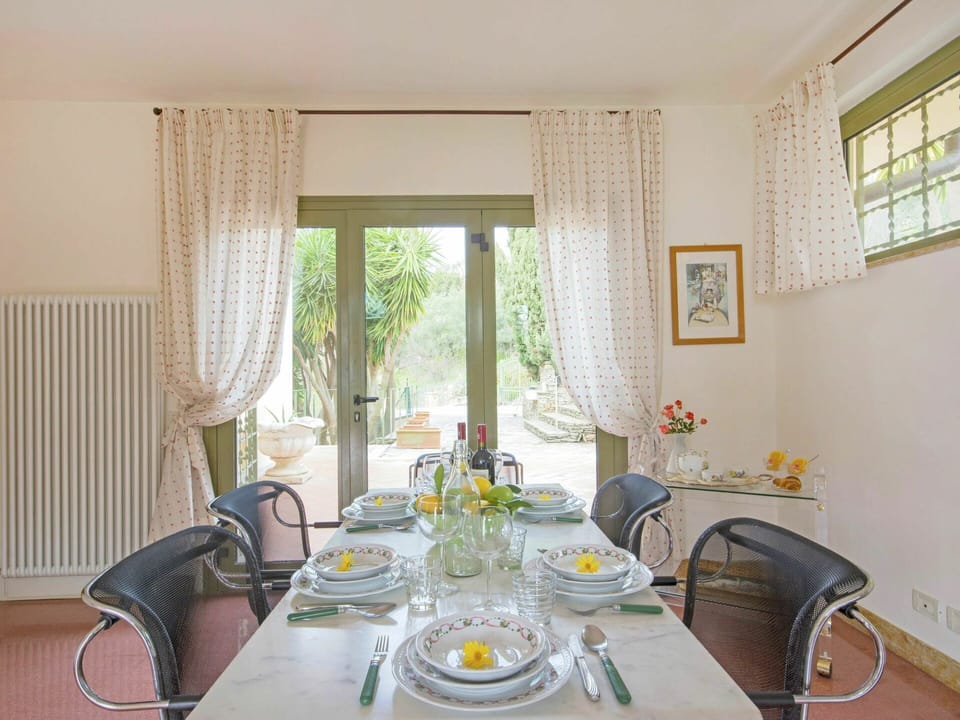 Table, Furniture, Flower, Property, Plant, Window, Interior Design, Textile, Shade, Lighting