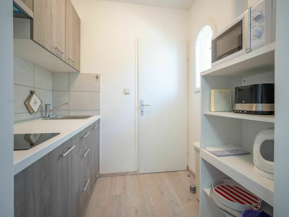 Cabinetry, Furniture, Sink, Building, Wood, Shelf, Floor, Flooring, Countertop