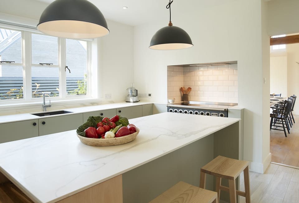 Ground floor: Fully equipped kitchen with electric range cooker and induction hob