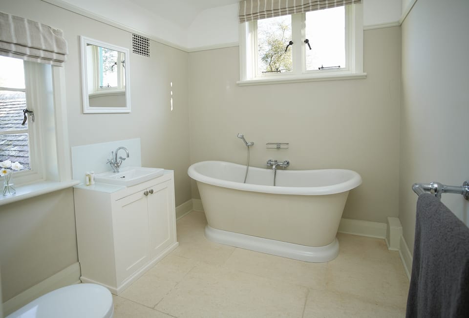 First floor: Family bathroom with free-standing bath