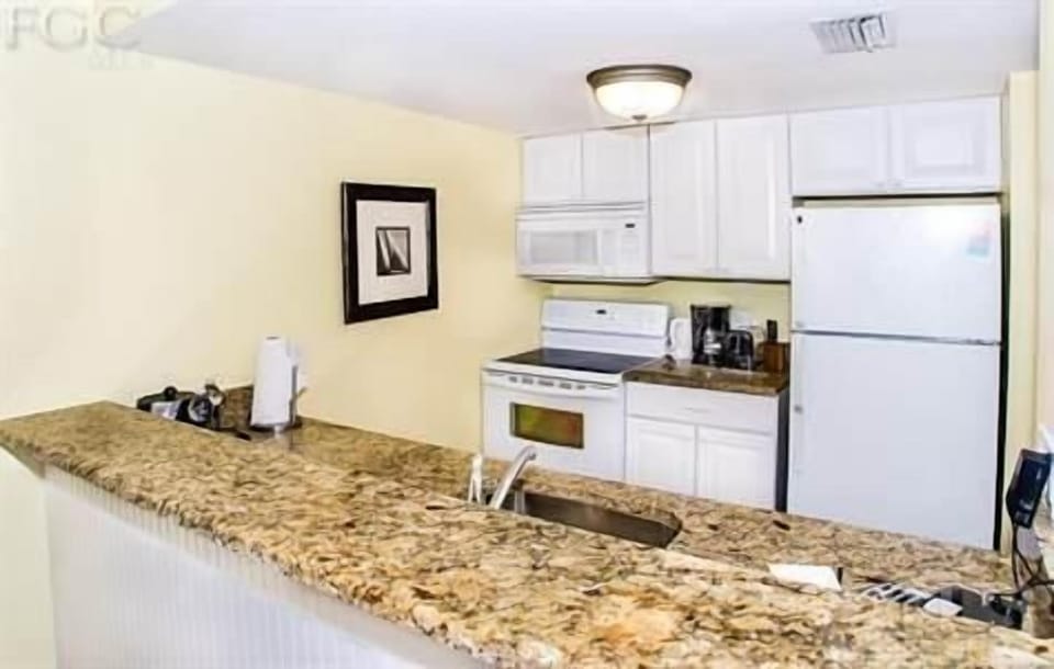 granite in kitchen with new appliances