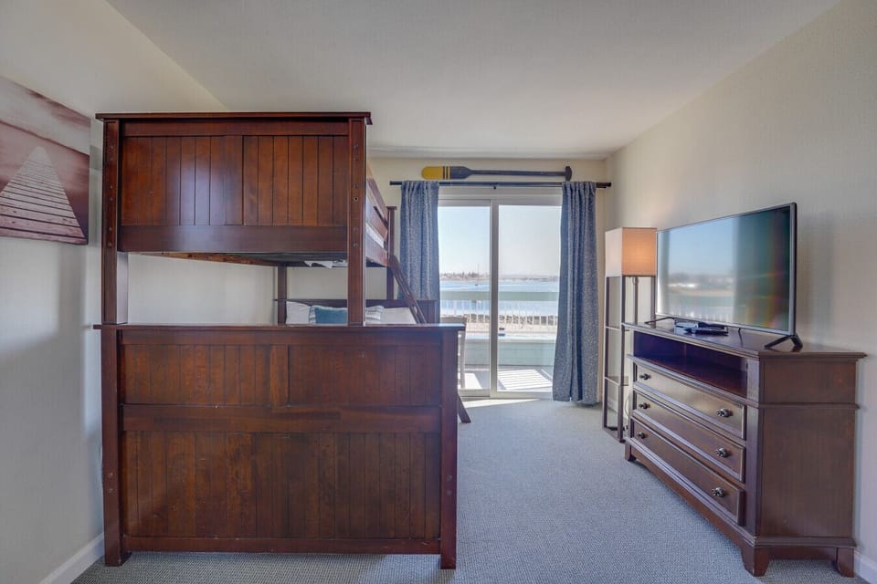 Front unit: The bunk room has a twin above a queen bed. There is an additional twin mattress on the floor.