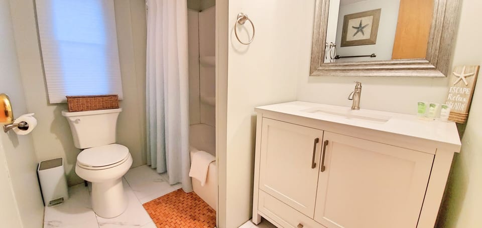 Newly remodeled Bath 2 on main level with tub. Between Bedrooms 2 & 3.