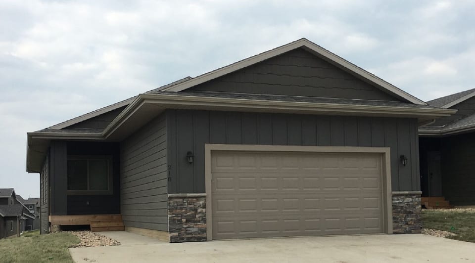 Front of cabin.  Two car garage and extra wide driveway.