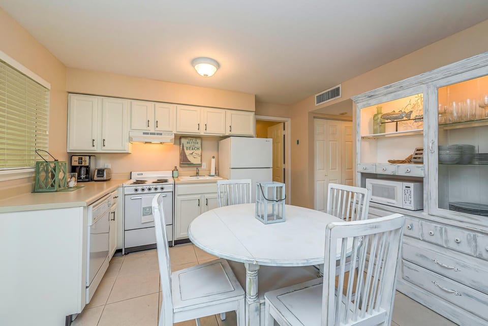 Light, bright kitchen is stocked with great cooking necessities