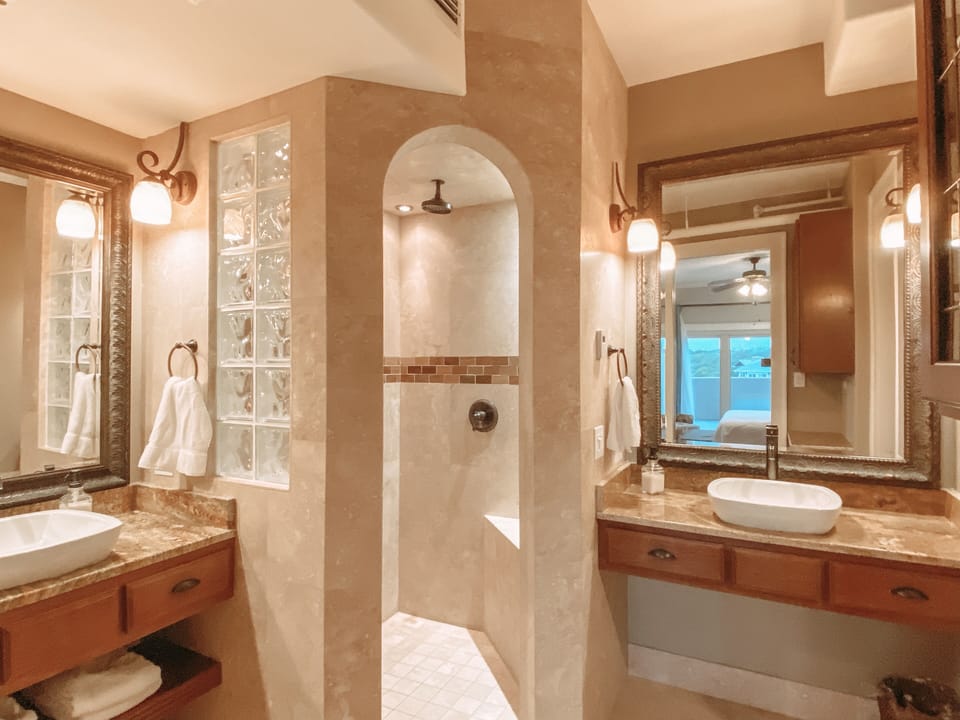 Master Bath with Travertine Shower / Double Granite Vanities / Private WC