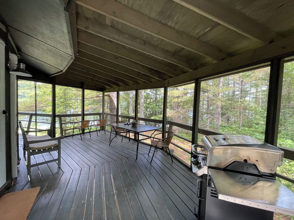 Seating for 6 for a BBQ on the covered deck.