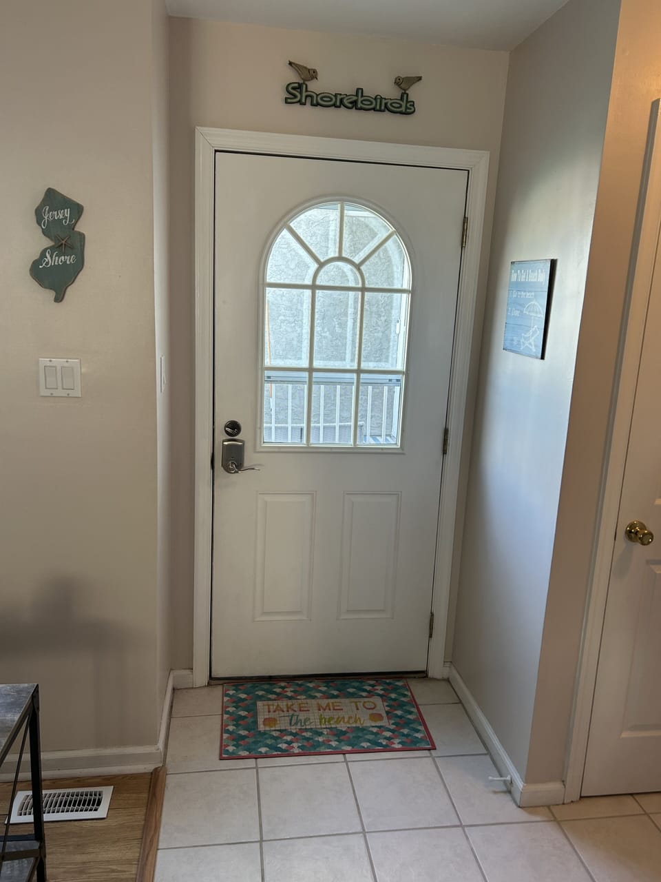 Door leading out to the patio and pool