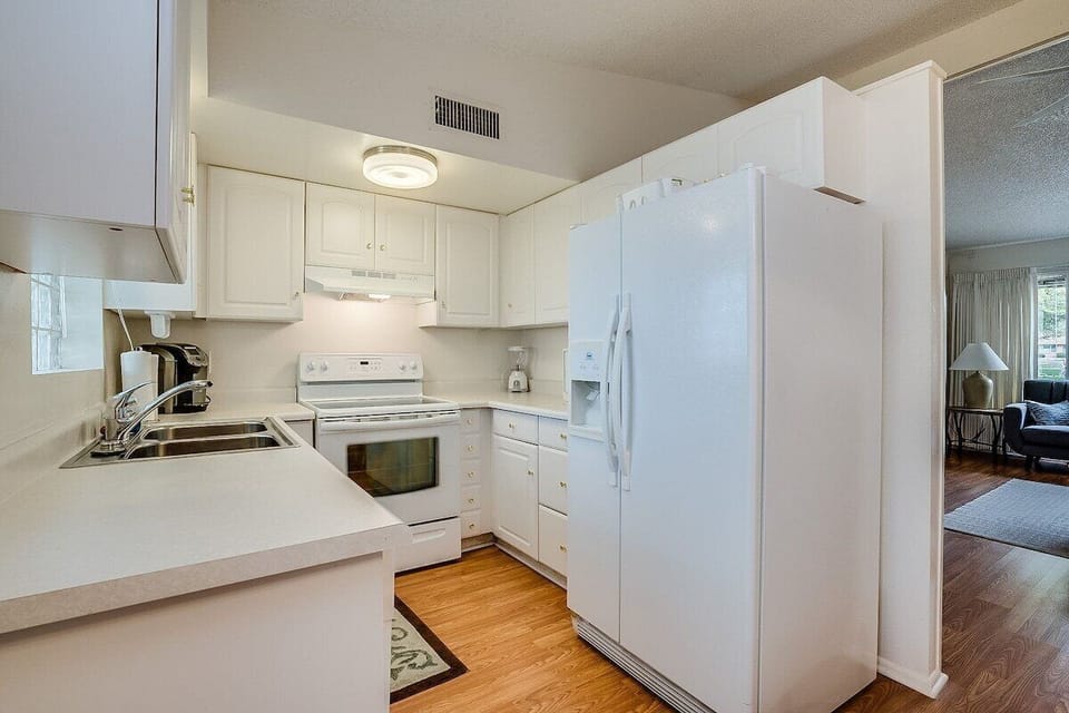 Enjoy cooking and gathering in the newly renovated kitchen—bright, charming, and open to the living room for easy, connected living.