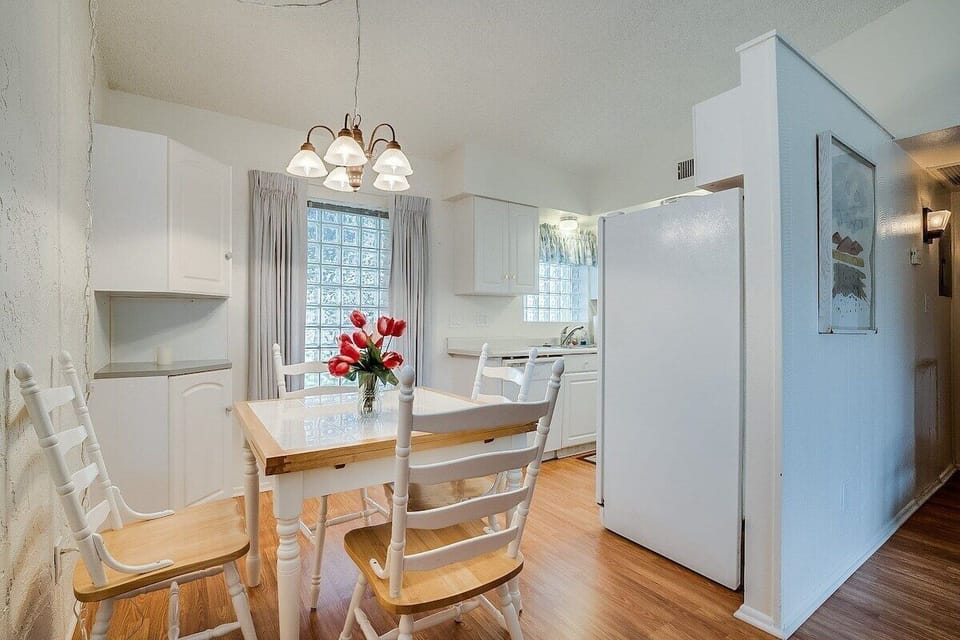Start your day or wind it down in the cozy dining nook—just off the kitchen and perfect for breakfast, coffee, or a friendly game of cards.