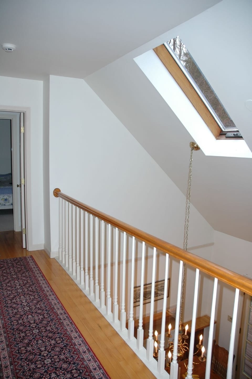 Upstairs hallway with skylight