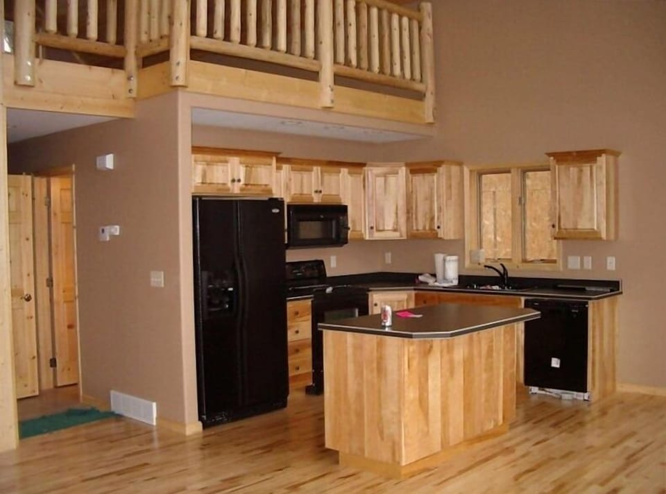 Modern kitchen with all utensils, pots & pans